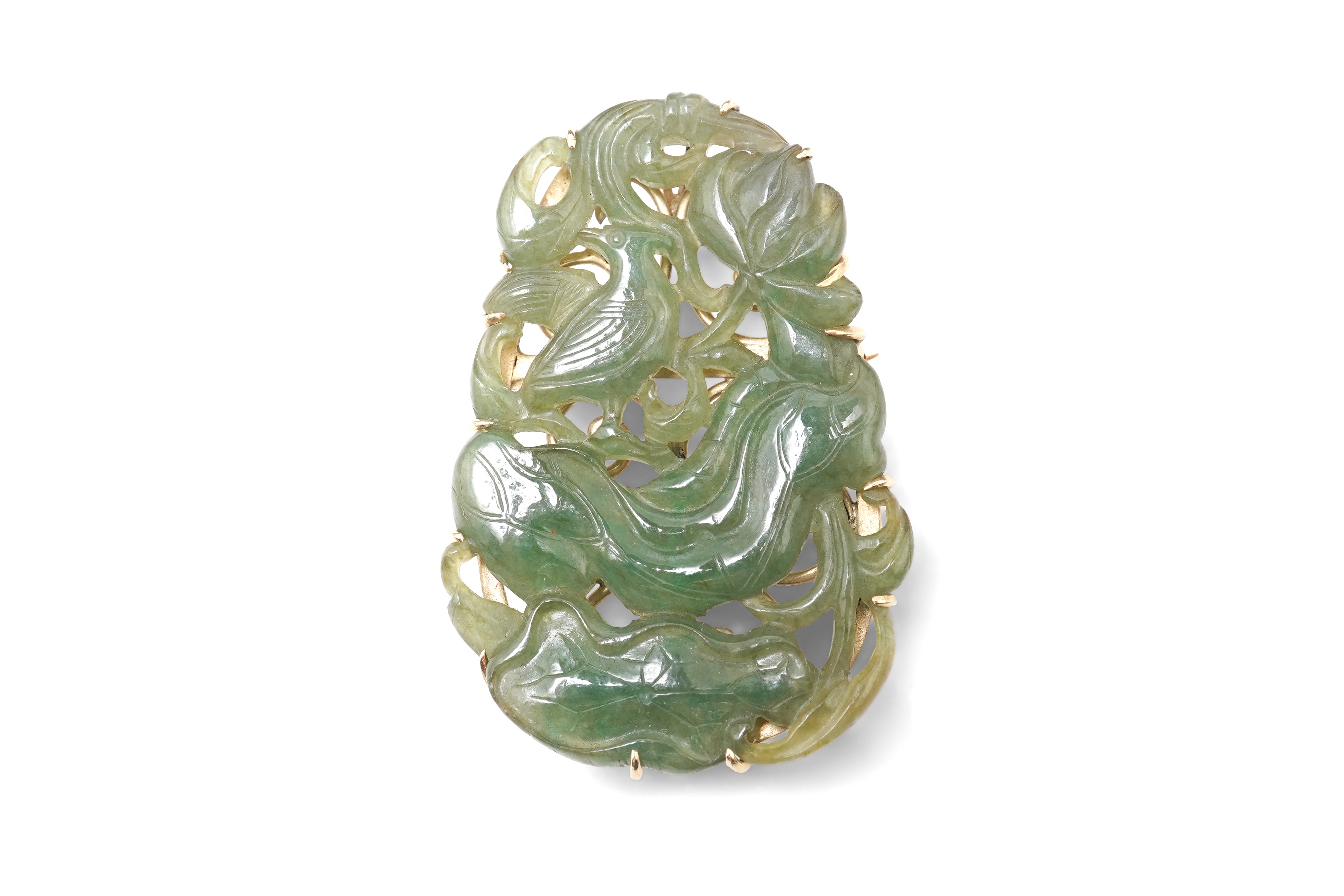 A carved jadeite brooch/pendant